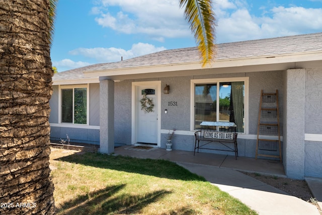 1531 S Padre Rd, Apache Junction, AZ 85119 - entrance to property with stucco siding, covered porch, and a yard