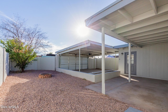 exterior space with a fire pit