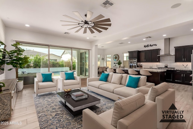 2316 E Canary Dr, Gilbert, AZ 85297 - living room featuring a ceiling fan, light wood-type flooring, and recessed lighting