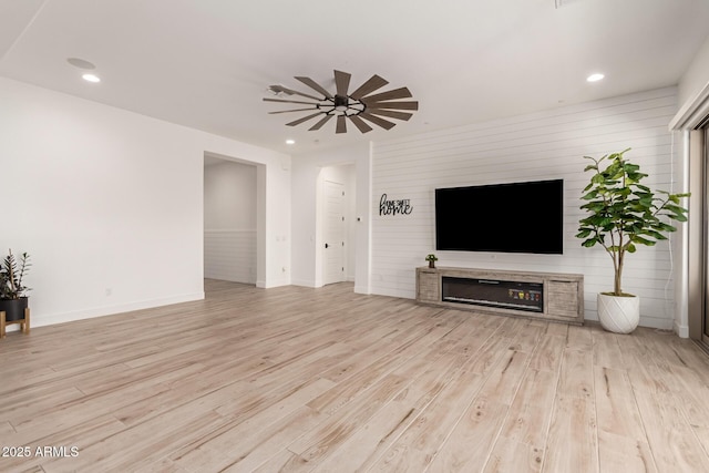 2316 E Canary Dr, Gilbert, AZ 85297 - unfurnished living room with ceiling fan, light wood-style flooring, baseboards, and recessed lighting