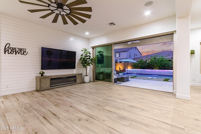2316 E Canary Dr, Gilbert, AZ 85297 - living area featuring wood finished floors, a ceiling fan, recessed lighting, and wood walls