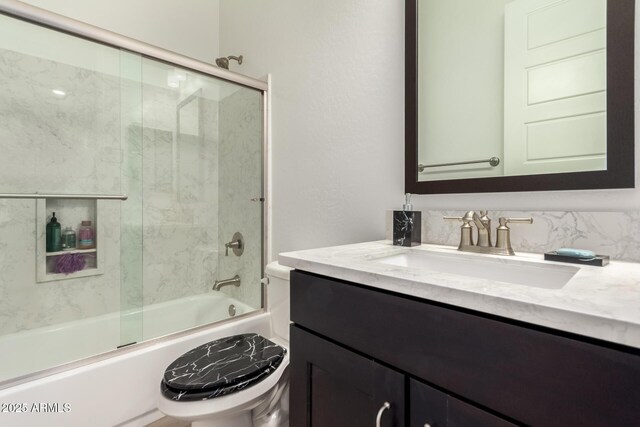 2316 E Canary Dr, Gilbert, AZ 85297 - full bathroom featuring vanity, toilet, and bath / shower combo with glass door