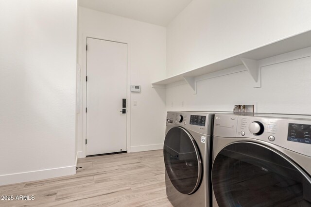2316 E Canary Dr, Gilbert, AZ 85297 - washroom featuring separate washer and dryer, light wood-style flooring, and baseboards