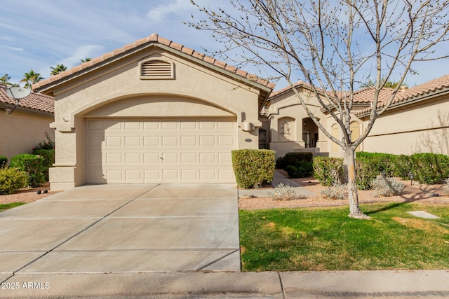 mediterranean / spanish-style house featuring a garage