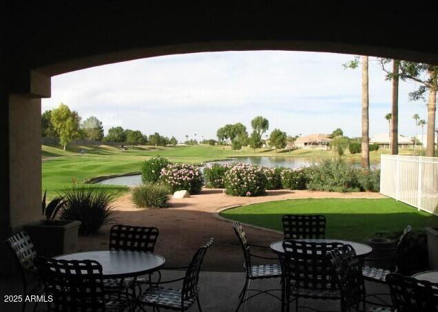 view of patio featuring a water view