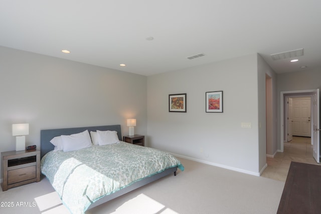 bedroom featuring light colored carpet