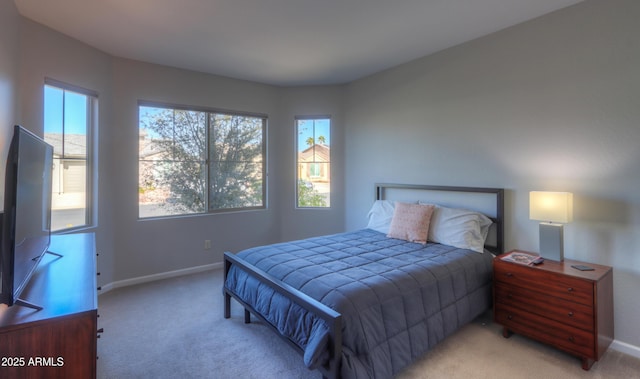 bedroom with light carpet