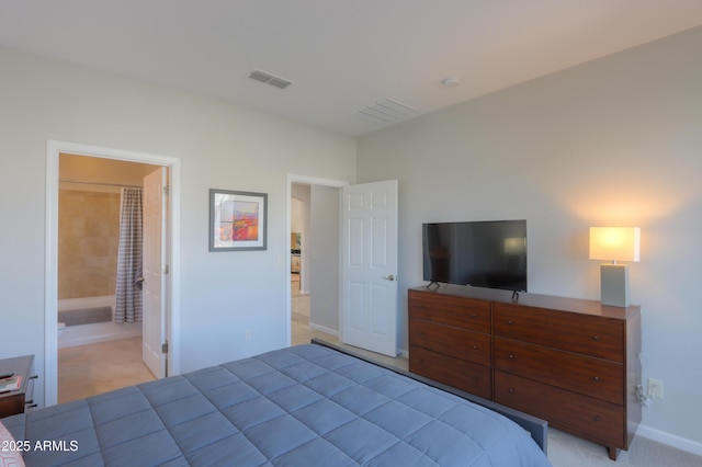 bedroom with ensuite bath