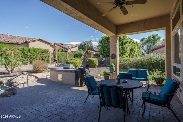 view of patio with ceiling fan