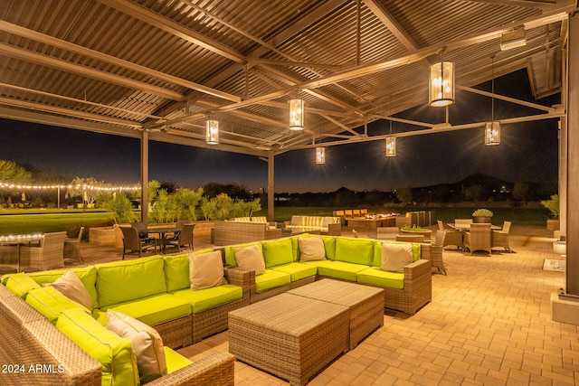 patio at night with an outdoor hangout area