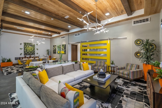 living room with a barn door, wooden ceiling, and beam ceiling