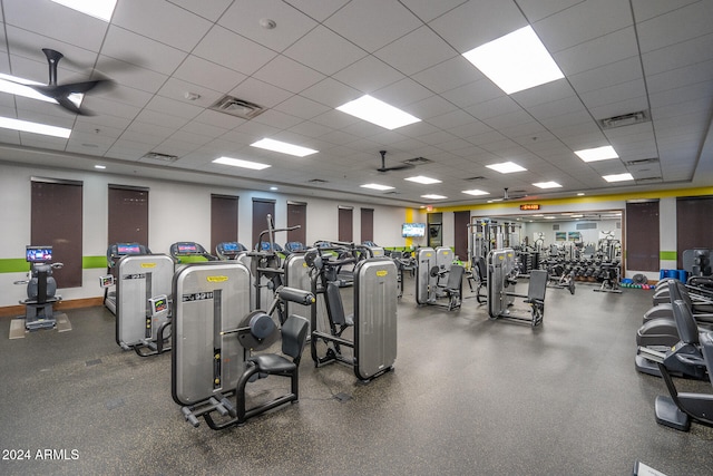 workout area featuring a drop ceiling