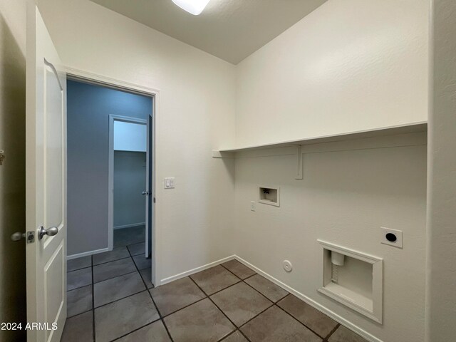 laundry room with washer hookup, hookup for a gas dryer, tile patterned floors, and hookup for an electric dryer