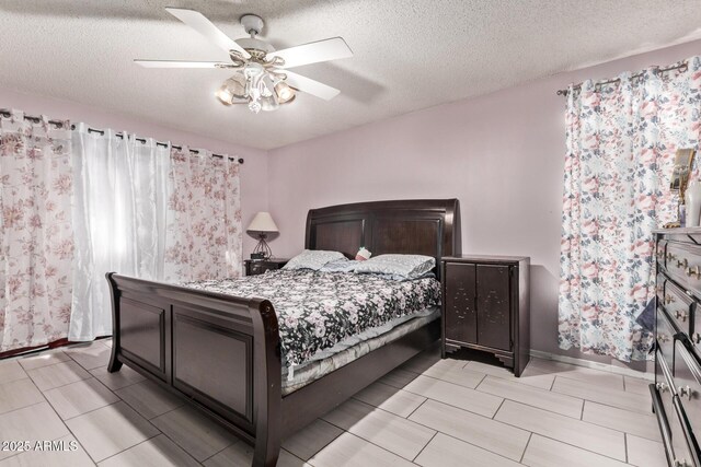 6408 W College Dr, Phoenix, AZ 85033 - bedroom with ceiling fan and a textured ceiling