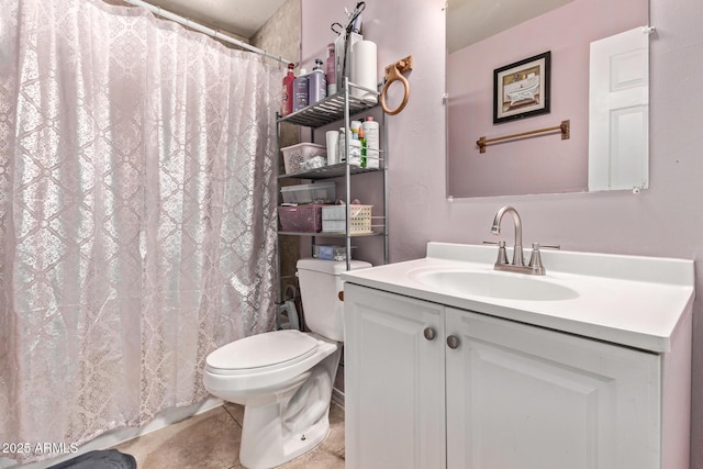 6408 W College Dr, Phoenix, AZ 85033 - bathroom with tile patterned floors, vanity, and toilet