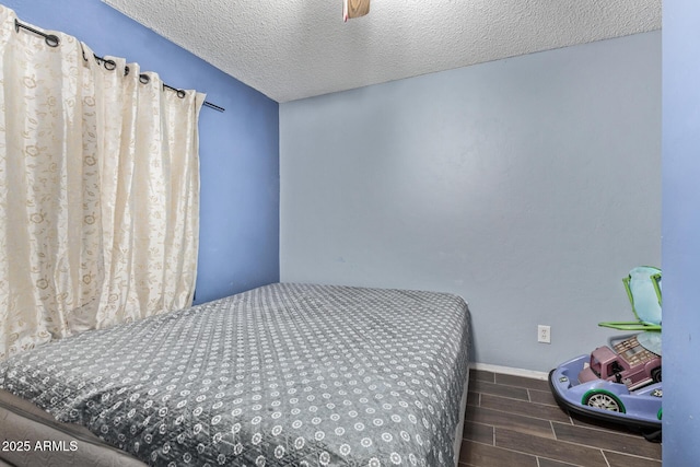 6408 W College Dr, Phoenix, AZ 85033 - bedroom with ceiling fan and a textured ceiling
