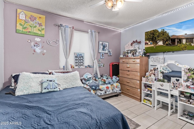 6408 W College Dr, Phoenix, AZ 85033 - bedroom featuring ceiling fan and a textured ceiling