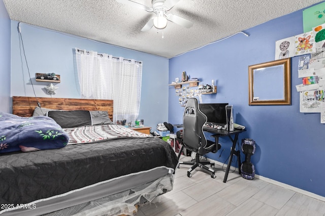 6408 W College Dr, Phoenix, AZ 85033 - bedroom featuring ceiling fan, light hardwood / wood-style floors, and a textured ceiling