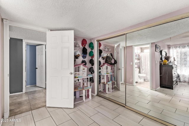 6408 W College Dr, Phoenix, AZ 85033 - interior space with a textured ceiling
