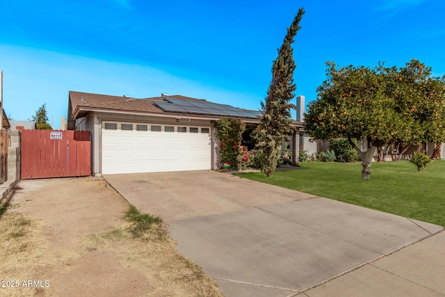 6408 W College Dr, Phoenix, AZ 85033 - single story home featuring a garage, a front lawn, and solar panels