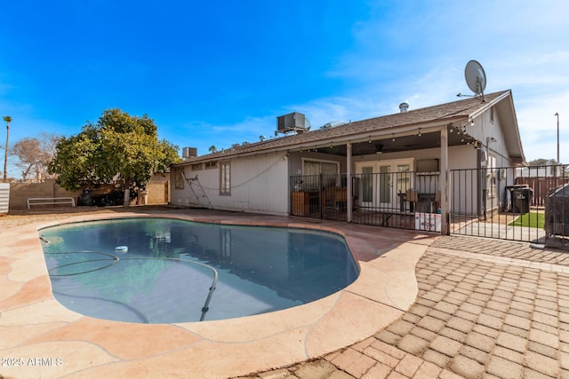 6408 W College Dr, Phoenix, AZ 85033 - view of pool featuring cooling unit, a patio, and ceiling fan