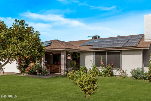 6408 W College Dr, Phoenix, AZ 85033 - view of front of property featuring a front lawn and solar panels