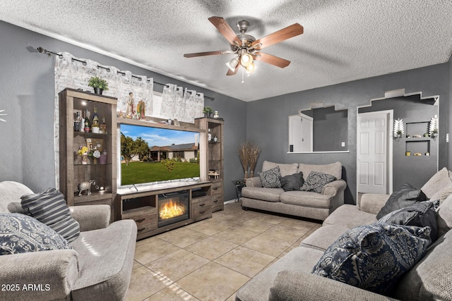 6408 W College Dr, Phoenix, AZ 85033 - living room featuring light tile patterned flooring, ceiling fan, and a textured ceiling