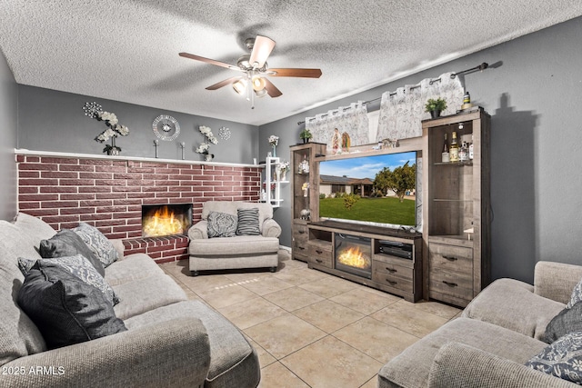 6408 W College Dr, Phoenix, AZ 85033 - tiled living room featuring a brick fireplace, a textured ceiling, and ceiling fan
