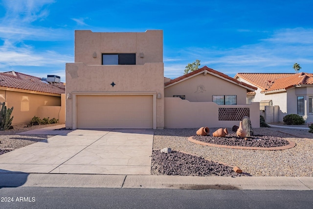 view of front of property with a garage and central air condition unit