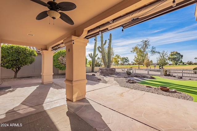 view of patio / terrace featuring ceiling fan