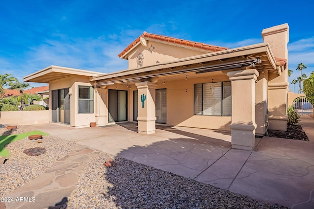 back of house featuring a patio