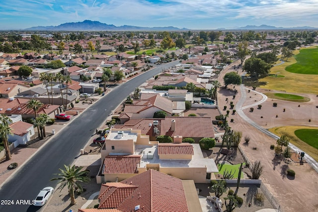 birds eye view of property featuring a mountain view