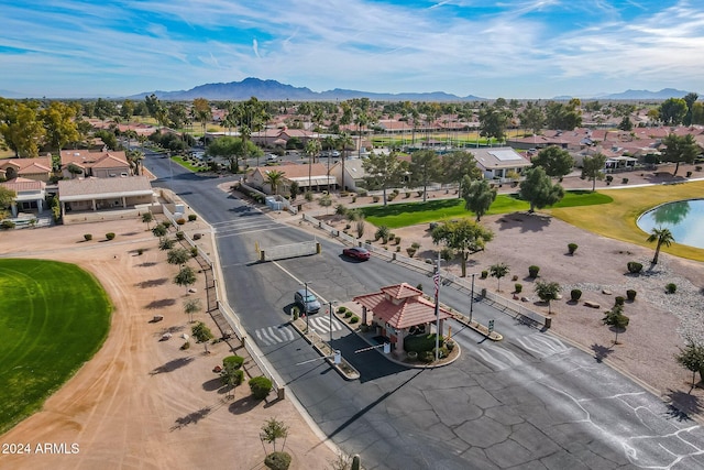 birds eye view of property with a mountain view