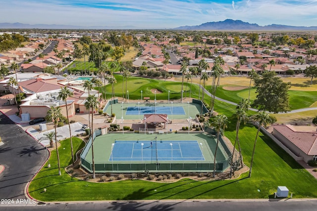 birds eye view of property featuring a mountain view