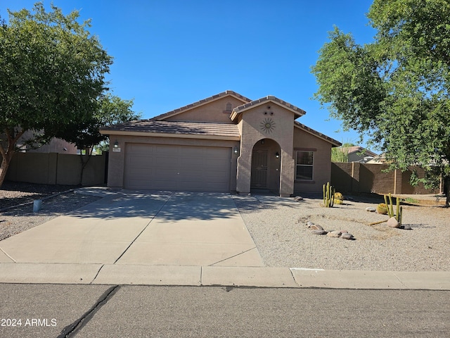 view of front of home with a garage