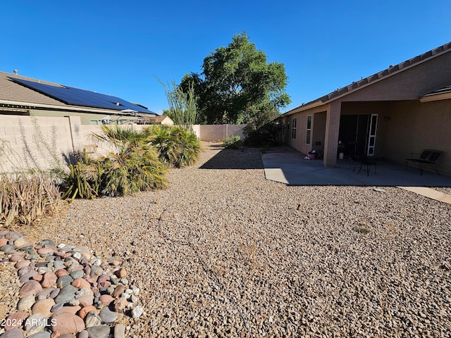 view of yard with a patio area