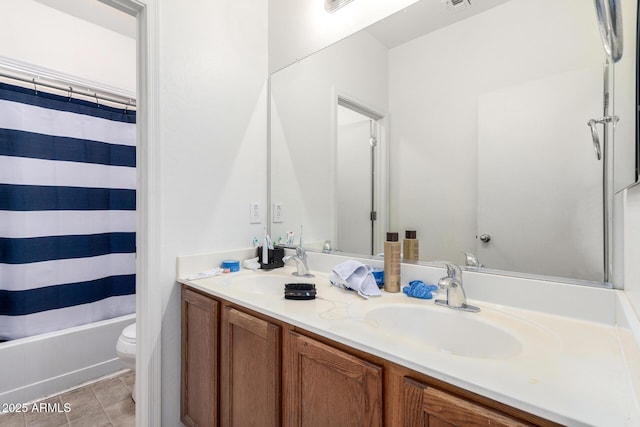 full bathroom with shower / bath combination with curtain, vanity, tile patterned floors, and toilet