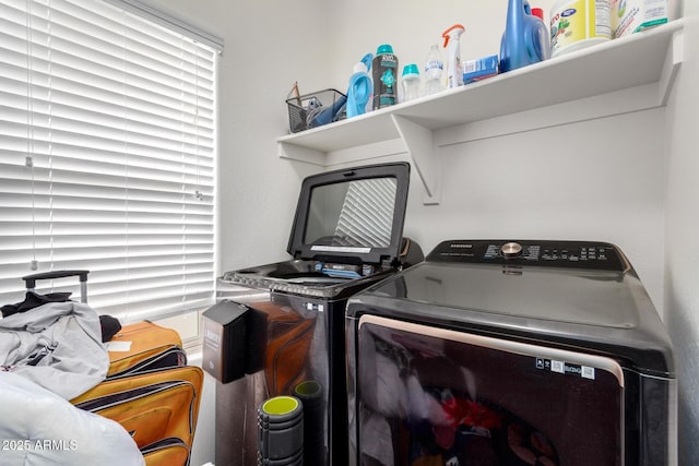 laundry room with washer and clothes dryer