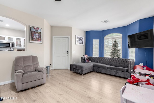 living room with light wood-type flooring