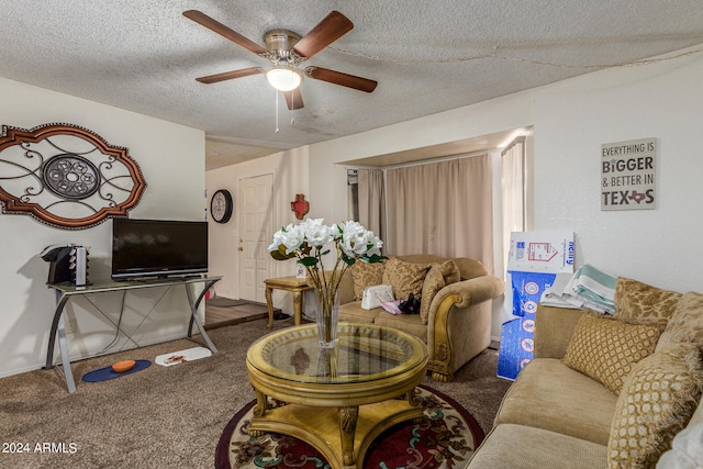 carpeted living room featuring a textured ceiling and ceiling fan