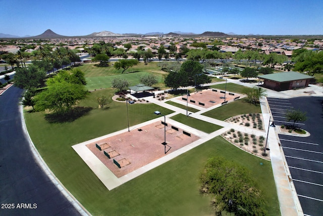 birds eye view of property featuring a mountain view