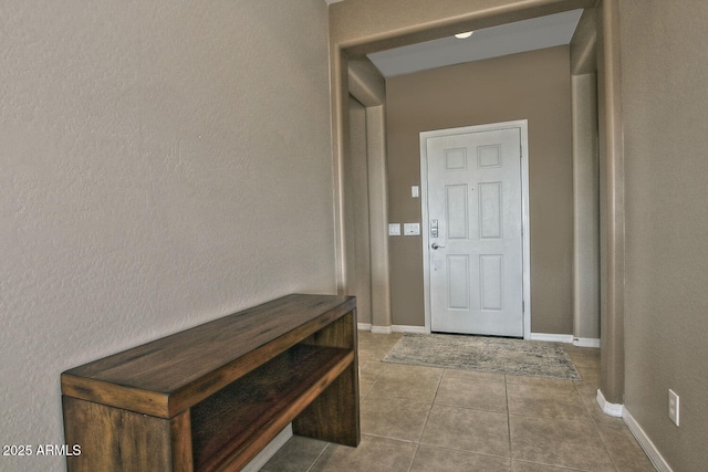 interior space with tile patterned floors