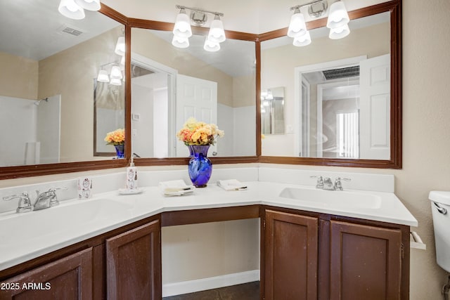 1342 W Emerald Ave Unit 286, Mesa, AZ 85202 - bathroom with double vanity and toilet