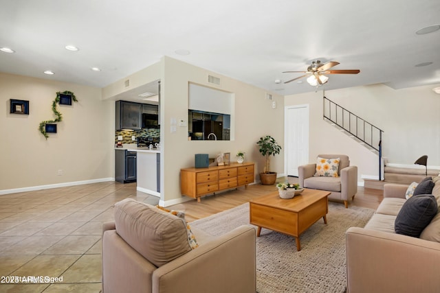 1342 W Emerald Ave Unit 286, Mesa, AZ 85202 - living area featuring stairs, a ceiling fan, baseboards, and recessed lighting