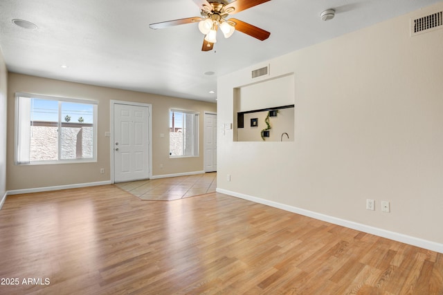 1342 W Emerald Ave Unit 286, Mesa, AZ 85202 - entryway featuring light wood finished floors, baseboards, and a ceiling fan