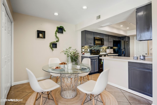 1342 W Emerald Ave Unit 286, Mesa, AZ 85202 - dining space featuring light tile patterned floors, recessed lighting, baseboards, and a raised ceiling