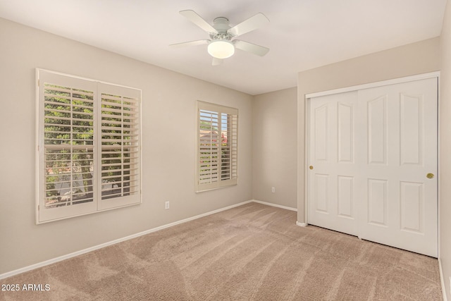 15011 W Verde Ln, Goodyear, AZ 85395 - unfurnished bedroom featuring carpet floors, a closet, and ceiling fan