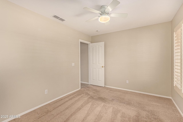 15011 W Verde Ln, Goodyear, AZ 85395 - unfurnished bedroom featuring light colored carpet and ceiling fan