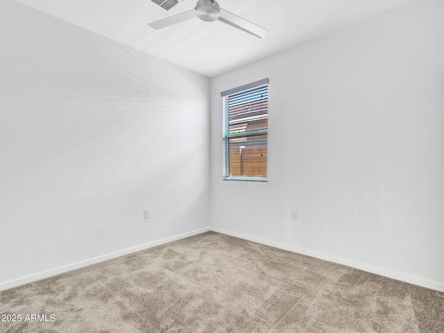 14160 W Georgia Dr, Surprise, AZ 85379 - empty room with carpet floors, a ceiling fan, and baseboards
