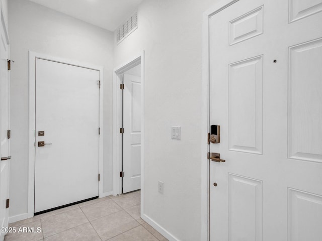 14160 W Georgia Dr, Surprise, AZ 85379 - entrance foyer with baseboards and light tile patterned flooring